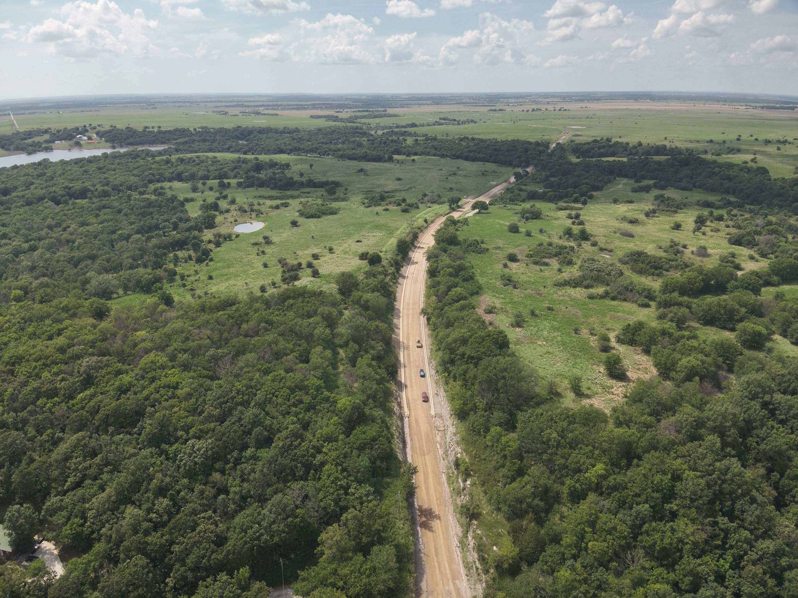 Winganon E. 300 Road replacement with tan colors and greenery
